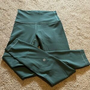 Lululemon wonder train hi waisted  25” leggings size 4 medium forest